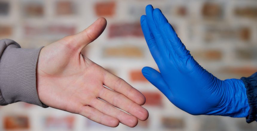 man-with-naked-hand-offers-shake-hands-with-woman-woman-with-hand-disposable-medical-glove-stopping-him-avoid-spread-coronavirus-covid-19-she-doesna-t-want-shake-hands_221404-115